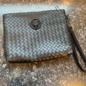 Black Woven Wristlet Clutch Bag with Tiger Head Emblem and Detachable Strap